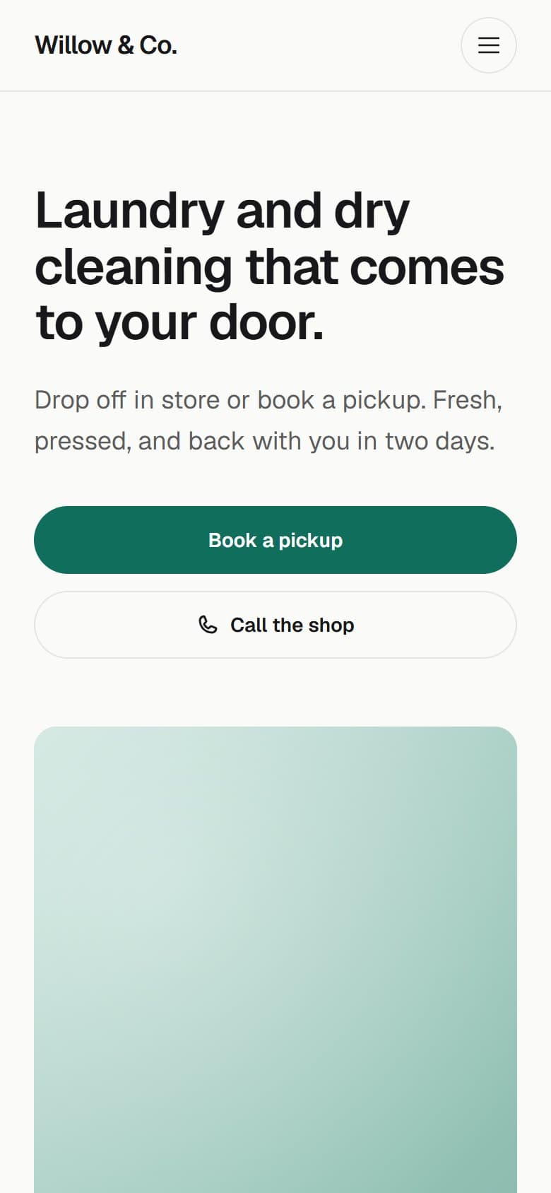 A dry cleaner's website on a phone